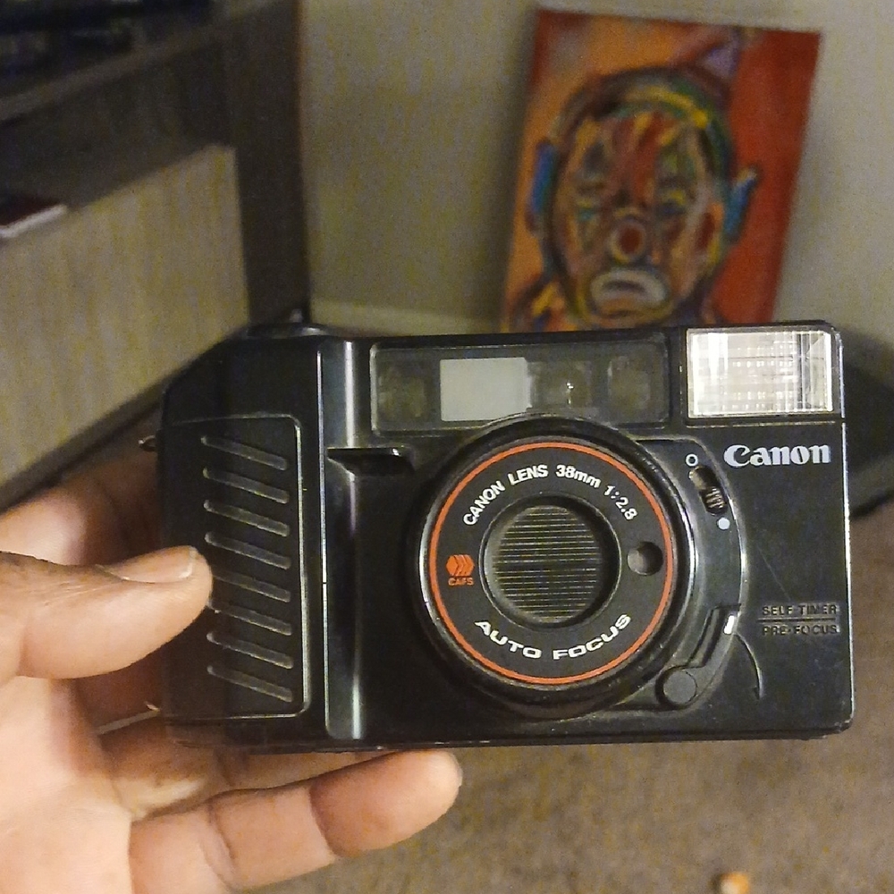 Canon Sure Shot point-and-shoot film camera, also known as the Canon AF35M II o